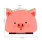 Side view of piglet book lamp showcasing light and design