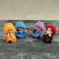 Decorative Resin Monk Buddha Showpiece Set of 4 with Traditional Straw Hats