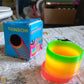 Rainbow Slinky Spring Toy – Compact, Portable Fun Toy for Kids & Adults, Great for Birthdays (1 Pc)